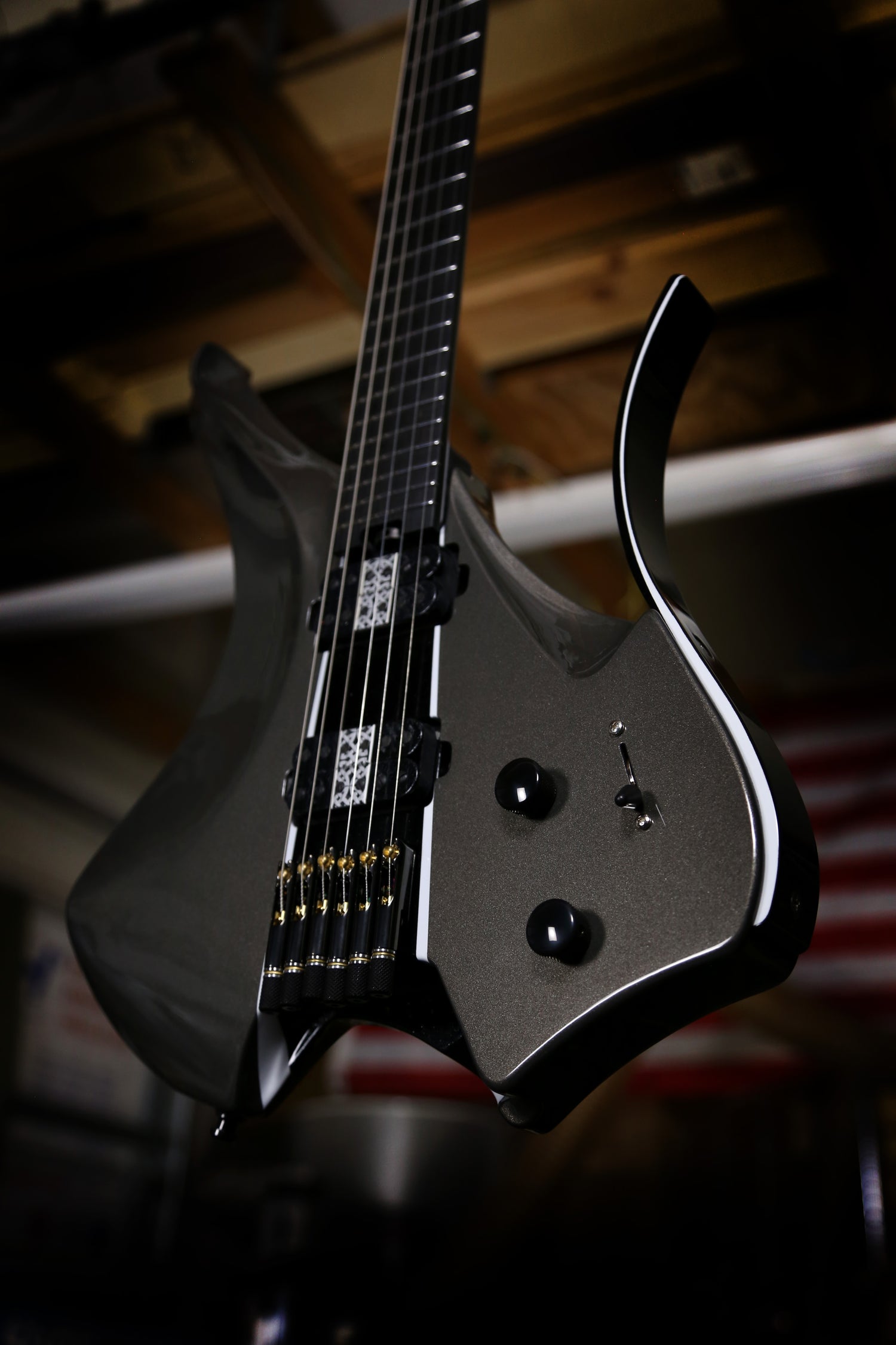 A modern custom Virtus electric guitar with a norse inspired design and custom bare knuckle Polymath humbuckers.