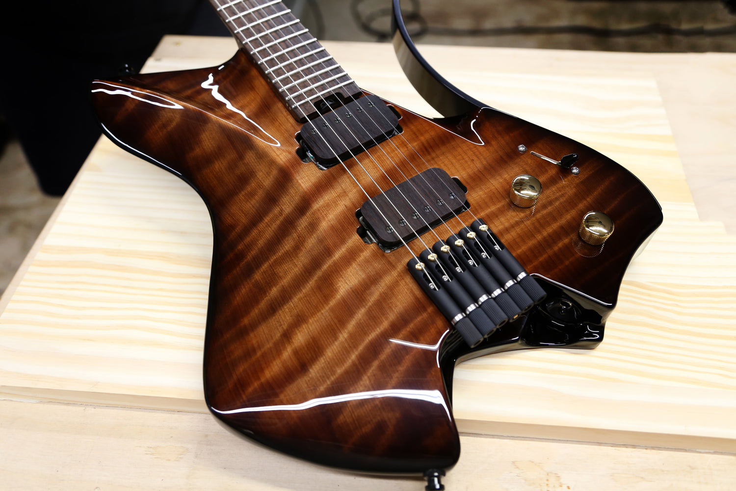 Redwood body headless ergonomic guitar